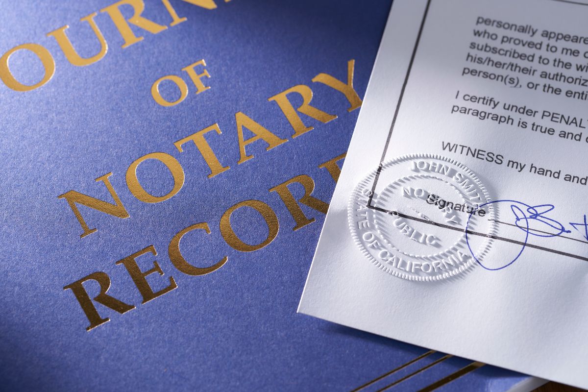 A close-up of a notary seal applied to official paperwork, symbolizing trust and authenticity.